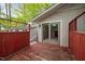 Back deck features a sliding glass door and stairs with a partial view of an additional back deck at 2852 Rue Sans Famille, Raleigh, NC 27607
