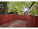 Image of back deck surrounded by mature trees for added privacy at 2852 Rue Sans Famille, Raleigh, NC 27607