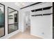 Charming dining area with custom shelves, tile floors, and bright lighting at 2852 Rue Sans Famille, Raleigh, NC 27607
