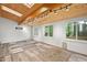 Sunroom featuring wood-paneled ceiling, skylights, windows, and neutral decor, creating a cozy atmosphere at 2852 Rue Sans Famille, Raleigh, NC 27607