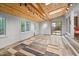 Inviting sunroom with wood-paneled ceiling, skylights, and multiple windows offering natural light at 2852 Rue Sans Famille, Raleigh, NC 27607