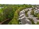 Aerial view of the homes in the neighborhood near a lake at 292 Joshua Glen Ln, Cary, NC 27519