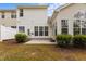 Exterior view of the back of the home, with a sunroom at 292 Joshua Glen Ln, Cary, NC 27519