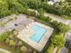 Aerial view of the community pool surrounded by lush greenery at 292 Joshua Glen Ln, Cary, NC 27519