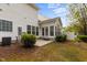 Exterior shot of a home with a sunroom featuring multiple windows at 292 Joshua Glen Ln, Cary, NC 27519