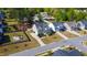 Aerial shot showcases this two story home with a backyard fire pit in a well-kept neighborhood at 3037 Freeman Farm Way, Rolesville, NC 27571
