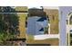 Aerial view of home showcasing roof, landscaping, and manicured lawn at 3037 Freeman Farm Way, Rolesville, NC 27571