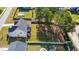 Expansive fenced backyard featuring lush green grass, a patio, and mature trees offering shade and privacy at 3037 Freeman Farm Way, Rolesville, NC 27571