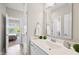 Clean bathroom with a modern vanity, lighting and decor at 3037 Freeman Farm Way, Rolesville, NC 27571