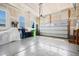 Clean, spacious garage with epoxy flooring, natural light, and ample room for parking and storage at 3037 Freeman Farm Way, Rolesville, NC 27571