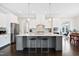 Bright, open kitchen with a large island, pendant lighting, stainless steel appliances, and a breakfast nook at 3037 Freeman Farm Way, Rolesville, NC 27571