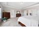 Large main bedroom featuring a trey ceiling and a large bed with white bedding at 3037 Freeman Farm Way, Rolesville, NC 27571