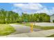 Community playground featuring modern equipment and ample space for recreational activities at 3037 Freeman Farm Way, Rolesville, NC 27571