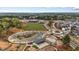 A beautiful aerial view of the neighborhood featuring green spaces, playgrounds, and modern architecture at 33 Highpointe Dr, Pittsboro, NC 27312