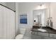 Bathroom featuring vanity, large mirror, and shower curtain at 33 Highpointe Dr, Pittsboro, NC 27312
