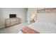 Bedroom featuring neutral decor, large window, and minimalist furniture at 33 Highpointe Dr, Pittsboro, NC 27312