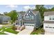 Beautiful two-story home with a well-manicured lawn and charming front porch at 33 Highpointe Dr, Pittsboro, NC 27312