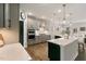 Well-equipped kitchen features stainless steel appliances, island, and plenty of storage at 33 Highpointe Dr, Pittsboro, NC 27312