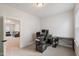 Bright office space with neutral walls and carpet, featuring a modern desk setup at 33 Highpointe Dr, Pittsboro, NC 27312