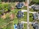 Aerial view of a neighborhood showcasing well-manicured lawns and swimming pool at 3545 Donlin Dr, Wake Forest, NC 27587