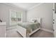 Cozy bedroom features neutral colors, a window view, and plush carpeting at 3545 Donlin Dr, Wake Forest, NC 27587