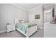 Comfortable bedroom with neutral colors, a plush bed, and natural lighting at 3545 Donlin Dr, Wake Forest, NC 27587