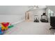 Expansive bonus room offers exercise equipment, toys, and abundant space at 3545 Donlin Dr, Wake Forest, NC 27587