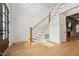 Inviting foyer featuring hardwood floors, a staircase, and elegant trim work at 3545 Donlin Dr, Wake Forest, NC 27587