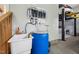 Spacious garage features car lift, utility sink, water filtration system, and ample storage at 3545 Donlin Dr, Wake Forest, NC 27587