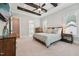 Spacious main bedroom featuring tray ceilings, ample natural light, and an en-suite bathroom at 3545 Donlin Dr, Wake Forest, NC 27587