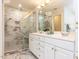 Beautiful bathroom with marble countertops, double vanity, and glass enclosed walk-in shower at 3608 Burwell Rollins Cir, Raleigh, NC 27612
