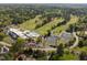 Overhead view showcasing community amenities including a pool, tennis courts, and parking at 3612 Darwin Rd, Durham, NC 27707
