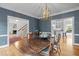 Refined dining room with hardwood floors and an adjoining staircase, perfect for Gathering gatherings and dinner parties at 3612 Darwin Rd, Durham, NC 27707
