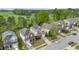 Aerial view of homes with manicured lawns, driveways, and tree-lined streets at 3811 Yates Mill Trail, Raleigh, NC 27606