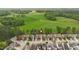 Aerial view of a neighborhood, showcasing houses, green spaces, and streets at 3811 Yates Mill Trail, Raleigh, NC 27606