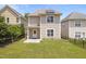 The backyard features a well-maintained lawn and a partial fence at 3811 Yates Mill Trail, Raleigh, NC 27606