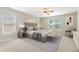 Inviting bedroom features a neutral color scheme, a ceiling fan, and natural light at 3811 Yates Mill Trail, Raleigh, NC 27606
