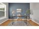Serene home office featuring hardwood floors and a stylish desk arrangement at 3811 Yates Mill Trail, Raleigh, NC 27606