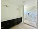 Modern bathroom features a double vanity and a large, tiled walk-in shower at 3817 Coach Lantern Ave, Wake Forest, NC 27587