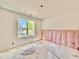 Bedroom under construction with window providing natural light and view, awaiting finishes for a comfortable retreat at 3817 Coach Lantern Ave, Wake Forest, NC 27587