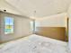 Bedroom under construction with multiple windows providing ample sunlight and open space for versatile living arrangements at 3817 Coach Lantern Ave, Wake Forest, NC 27587