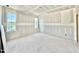 Bedroom featuring two large windows and bright lighting at 3817 Coach Lantern Ave, Wake Forest, NC 27587