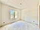 Bedroom with a window offering natural light and an electrical outlet at 3817 Coach Lantern Ave, Wake Forest, NC 27587