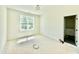 This bedroom features a large window and an ensuite bathroom at 3817 Coach Lantern Ave, Wake Forest, NC 27587