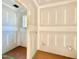 Unfinished closet reveals the framework, natural light from window and flooring beneath at 3817 Coach Lantern Ave, Wake Forest, NC 27587