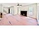 Spacious living room with fireplace, large windows, and natural light, awaiting personalization at 3817 Coach Lantern Ave, Wake Forest, NC 27587