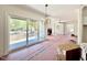 Bright living room with large sliding glass doors leading to an outdoor space; perfect for entertaining and relaxing at 3817 Coach Lantern Ave, Wake Forest, NC 27587