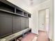 Convenient mudroom boasts custom built-in storage and bench seating; ideal for organization at 3817 Coach Lantern Ave, Wake Forest, NC 27587