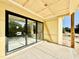 Covered patio boasting large sliding glass doors with a view of the outdoors at 3817 Coach Lantern Ave, Wake Forest, NC 27587