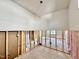 Partially framed room under construction, revealing insulation, wiring, and a window offering natural light and layout flexibility at 3817 Coach Lantern Ave, Wake Forest, NC 27587